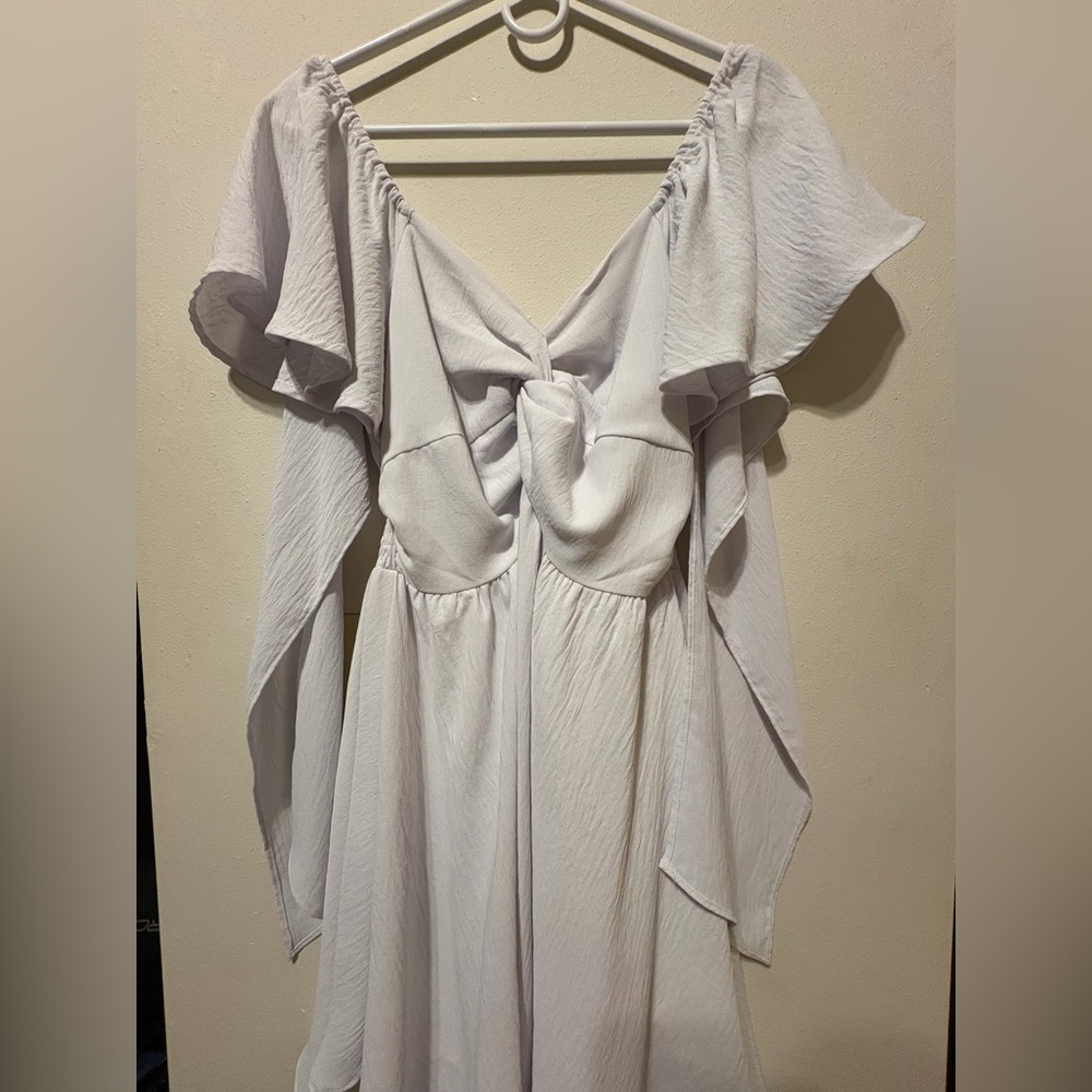 Super Cute Worn Once White dress Size M off the shoulder V neck w/ wavy pattern